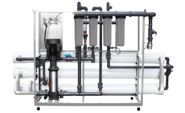 High-capacity industrial water filtration system with multiple filters and pumps for effective water purification. Suitable for commercial and industrial water treatment applications.