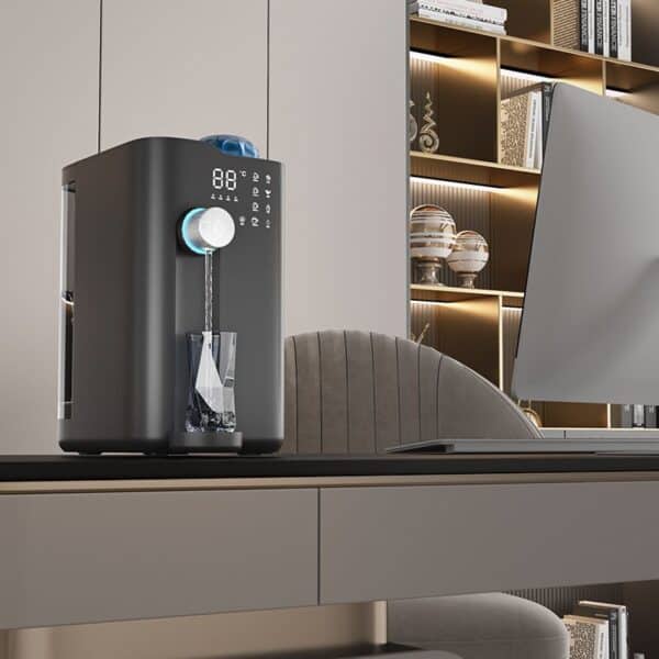 Compact countertop water dispenser with digital display and customizable temperature control, ideal for modern office and home environments.