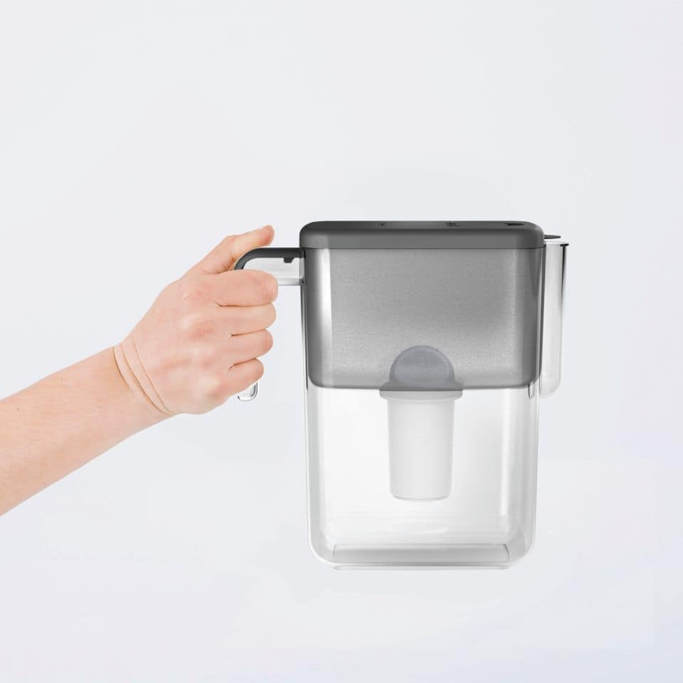 Portable water filter pitcher for clean drinking water, easy to use and refill. Ideal for home or on-the-go hydration solutions with modern design and efficient filtration system.