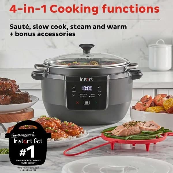 Compact multi-cooker with digital display, ideal for sauté, slow cook, steam, and warm functions; showcased with prepared dishes on a modern kitchen countertop.