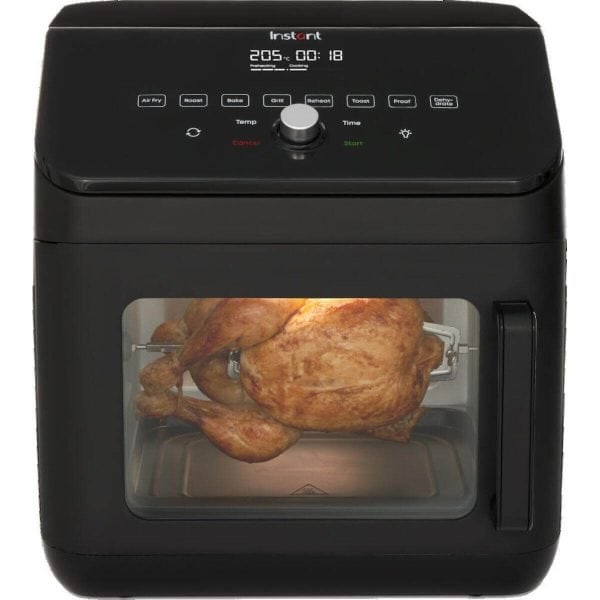 Crispy roasted chicken cooking in a black digital air fryer with touch controls for various preset options, modern kitchen appliance, healthy food preparation, space-saving design, quality kitchen gadget.