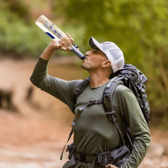 Refreshing outdoor water bottle, hydration, hiking, backpacker hydration, outdoor adventure, trail hydration, sports water bottle, hiking gear, active lifestyle, hydration bottle, trekking essentials, outdoor gear, water intake, fitness hydration, adventure equipment.